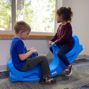 playing with seesaw in Bounce ABA Preschool of Essex Junction, Vermont